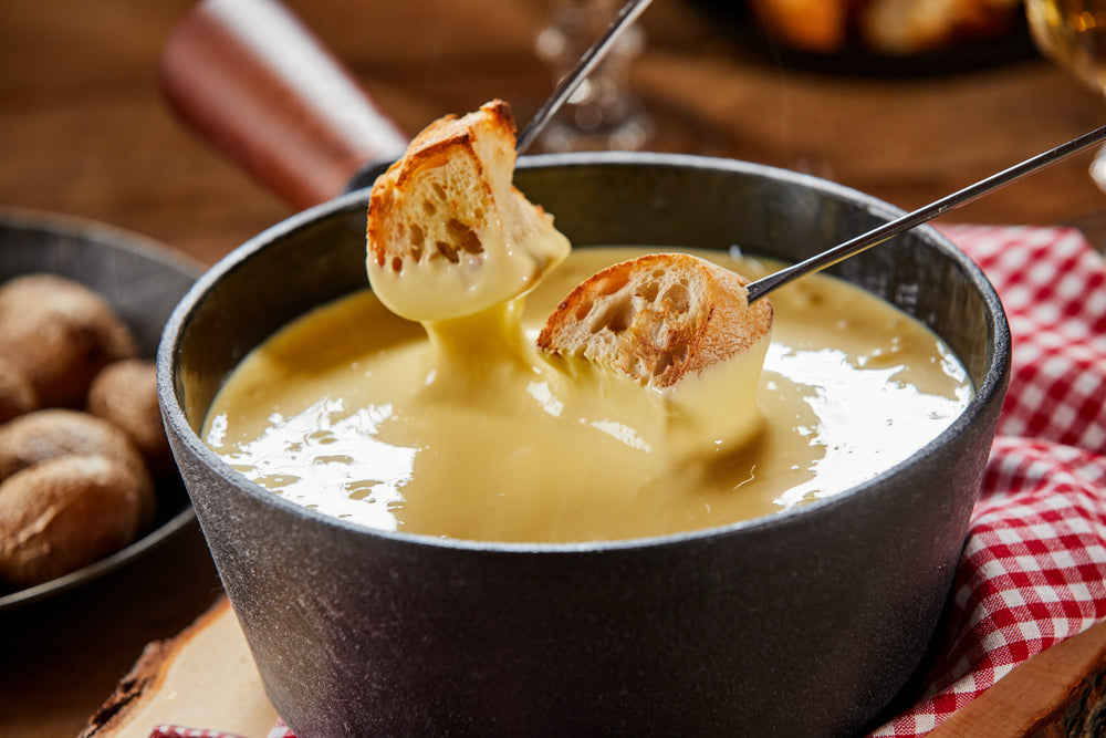 El encanto de la raclette: de dónde viene y cómo se prepara
